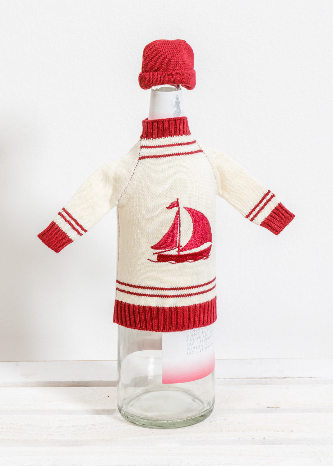 Flaschenpullover Mütze rot Segelschiff