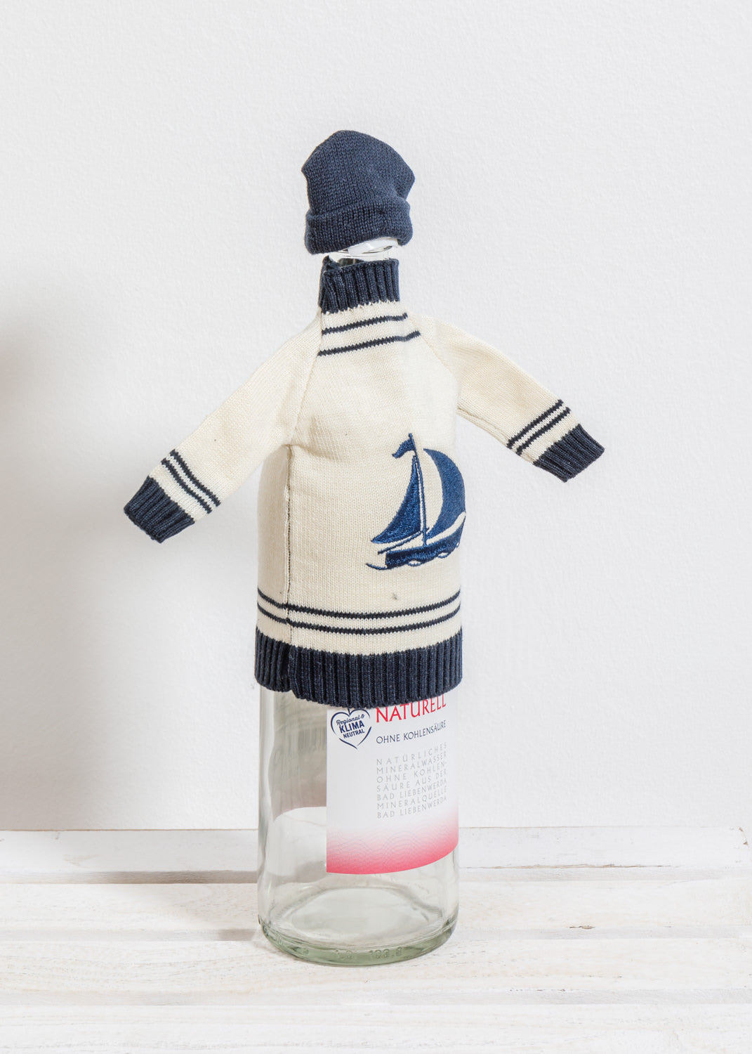 Flaschenpullover Mütze blau Segelschiff