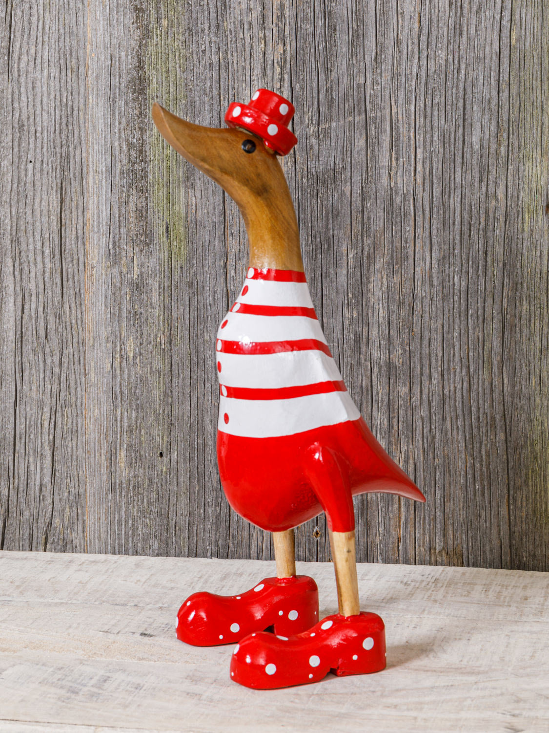 Ente aus Holz rot geringelter Badeanzug