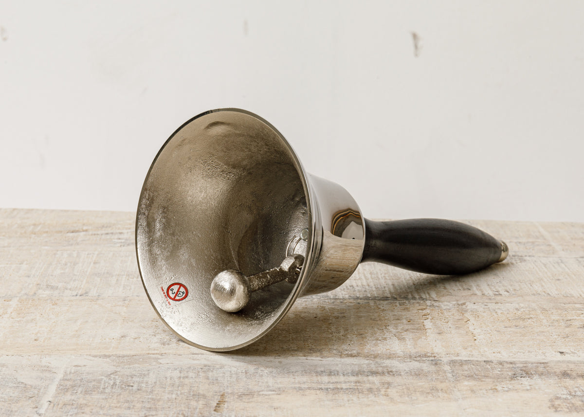 Große Handglocke mit schwarzem Griff